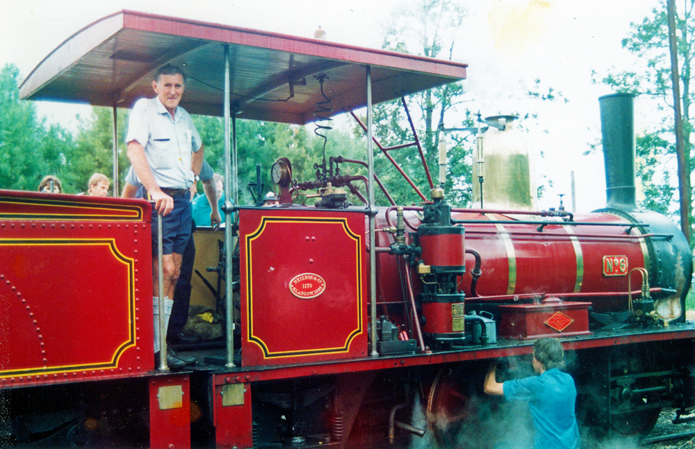 Driver in the cab of restored locomotive, engine No. 6, travelling from Swanbank to Racecourse, Ipswich, 1990