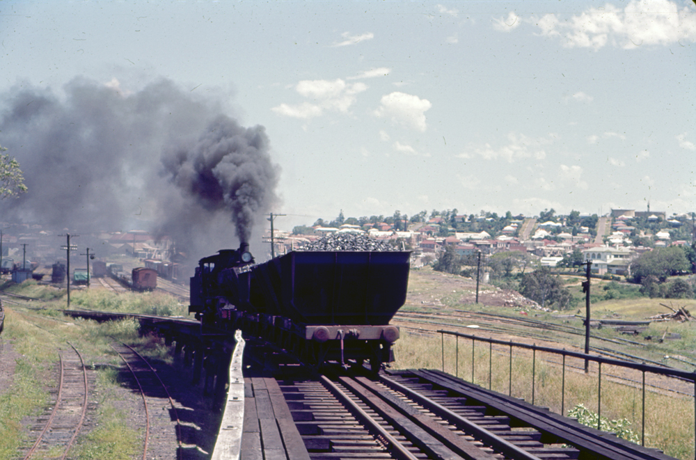 Locomotive and wagons on coal stage at Ipswich Railway Workshops, North Ipswich, 1969