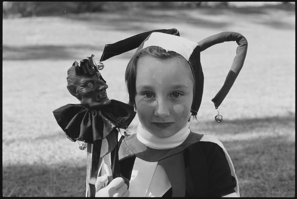 Unidentified child dressed up as a jester, Ipswich, July 1985