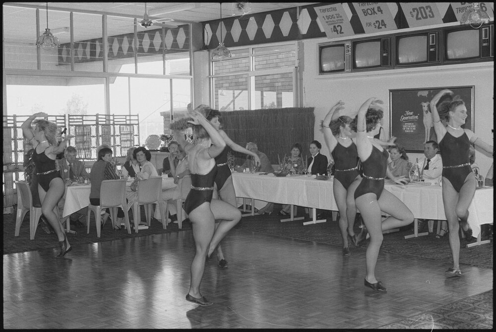 Unidentified female dancers preforming at the Ipswich Greyhound Racing Club, Ipswich, July 1985