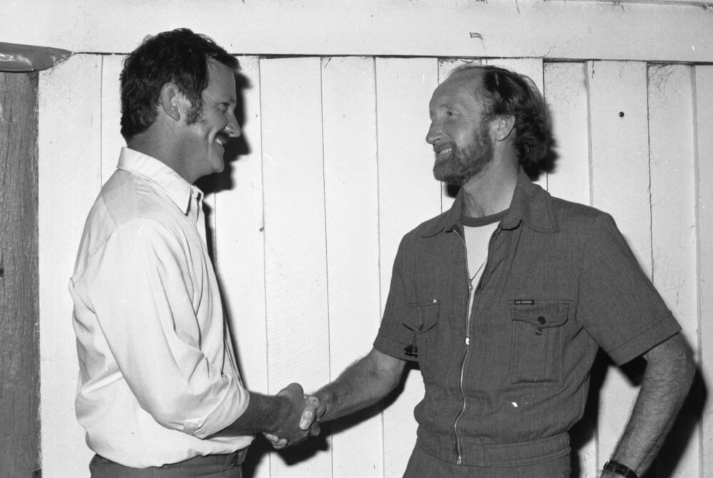 Unidentified men shaking hands, Ipswich, December 1977