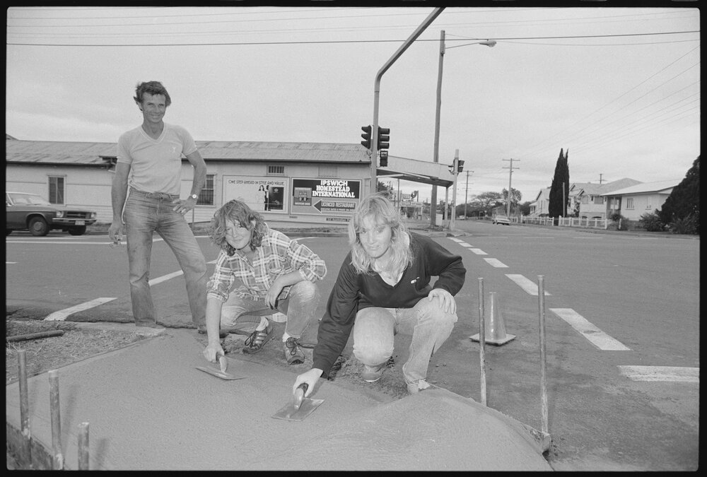 Unidentified people doing cementing at the corner of Blackstone Road and South Station Road, Silkstone, August 1985