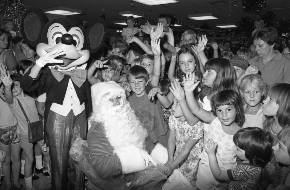 Mickey Mouse &amp; Santa Claus at a Christmas party, Ipswich, December 1977