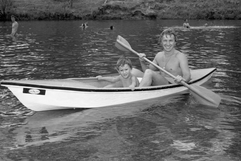 Man and young boy kayaking at Colleges Crossing Recreation Reserve, Chuwar, January 1978