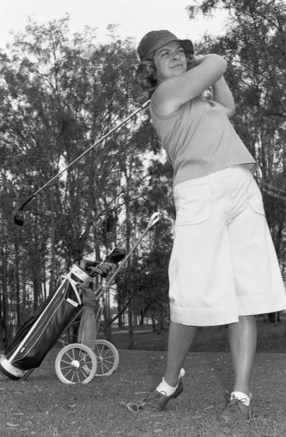 Golfer in mid-swing, Ipswich, January 1978