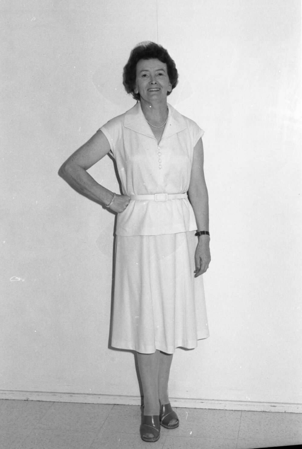 Reid's Department Store model in light blouse and skirt, Ipswich, January 1978
