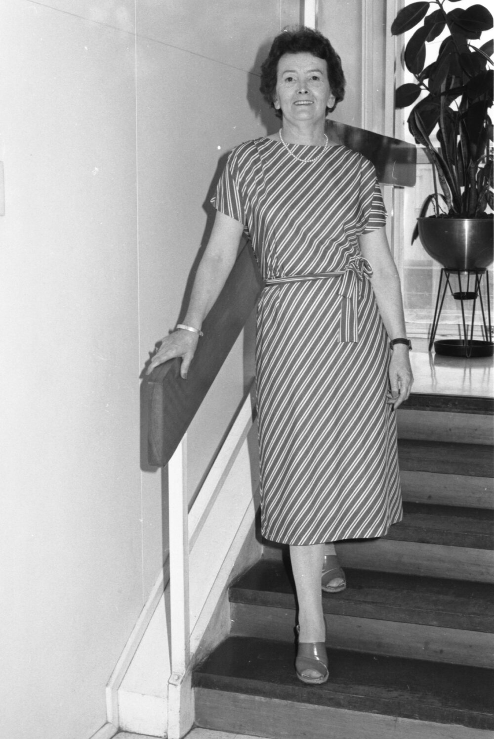 Reid's Department Store model in striped dress, Ipswich, January 1978