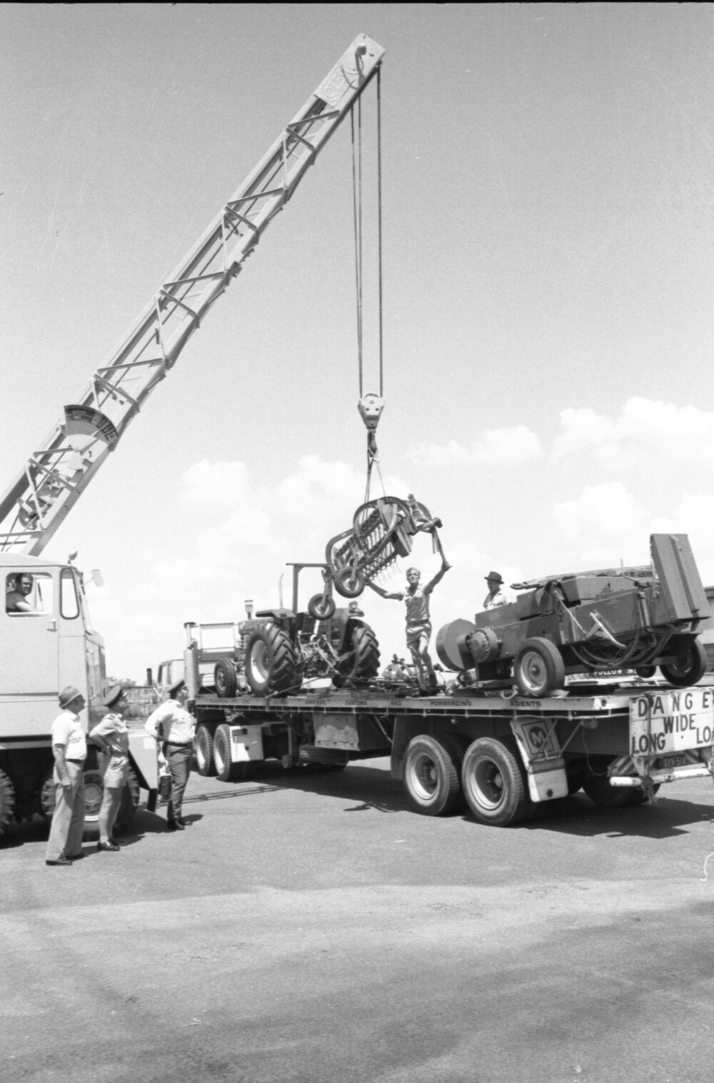 Hay baling equipment arriving at Amberley Air Field ahead of volunteer harvest weekend, Amberley, Ipswich, Queensland, January 1978