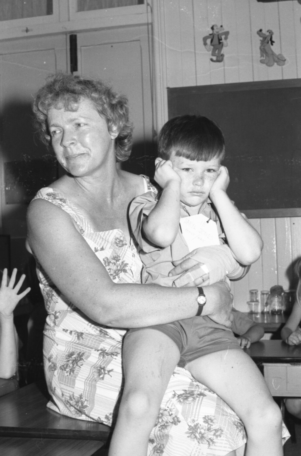 Unidentified woman with Daryl Jones, school classroom, Ipswich, Queensland, January 1978