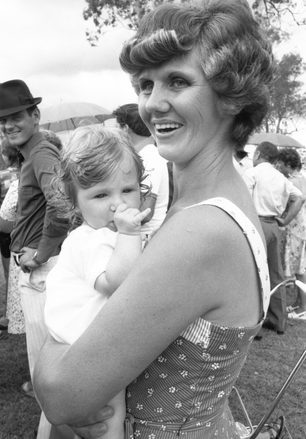 Woman and baby attending the Grandchester State School centenary celebration, Grandchester, Ipswich, January 1978