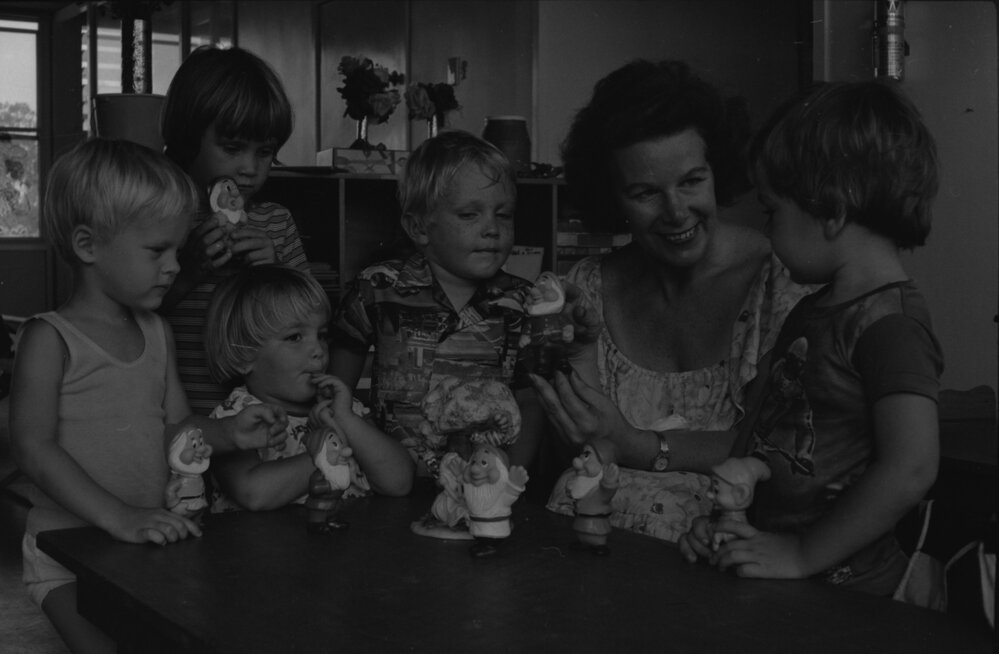 Woman playing with children at at the Grandchester State School centenary celebration, Grandchester, Ipswich, January 1978