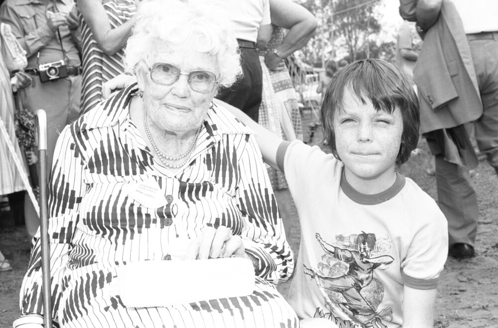 Former pupil and young boy attending the Grandchester State School centenary celebration, Grandchester, Ipswich, January 1978