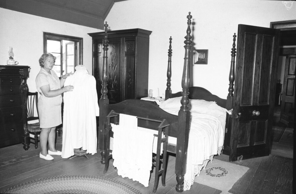 Mrs Wass touring a bedroom inside Wolston House, Wacol, Queensland, January 1978