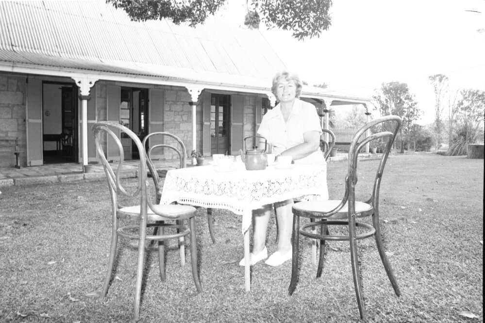 Mrs Wass taking tea outside Wolston House, Wacol, Queensland, January 1978