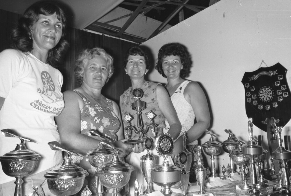 Women with darts trophies, Ipswich, January 1978