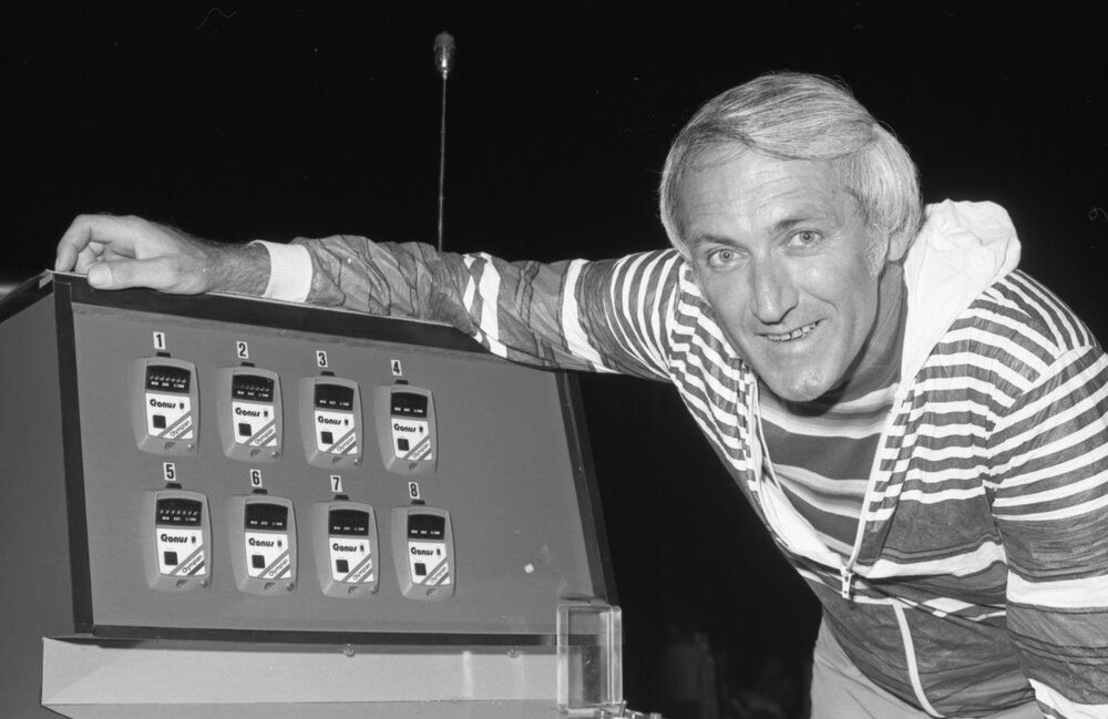 Unidentified man with Cronus stopwatch device at an olympic pool, Ipswich, February 1978