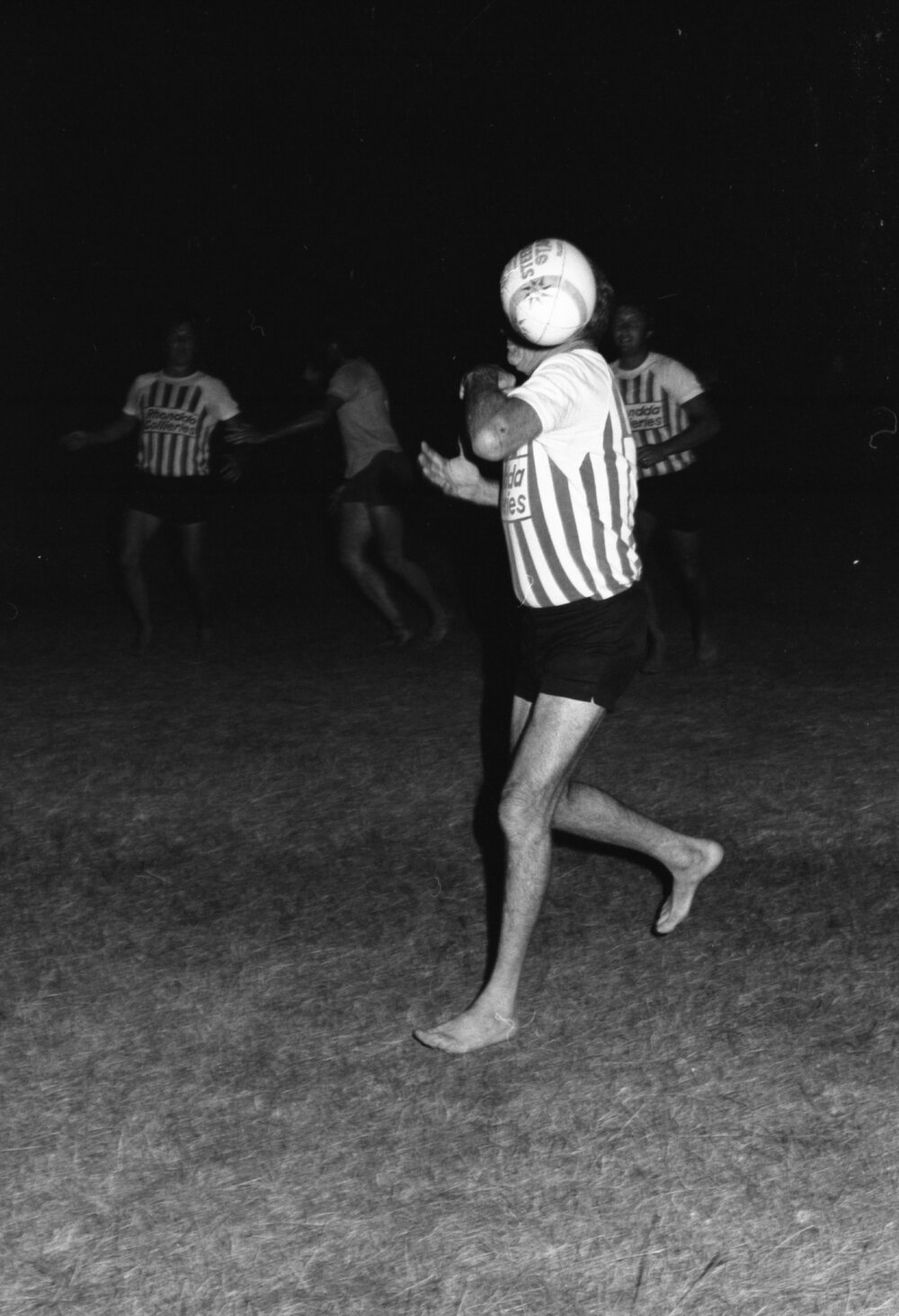Men playing touch football, Ipswich, November 1977