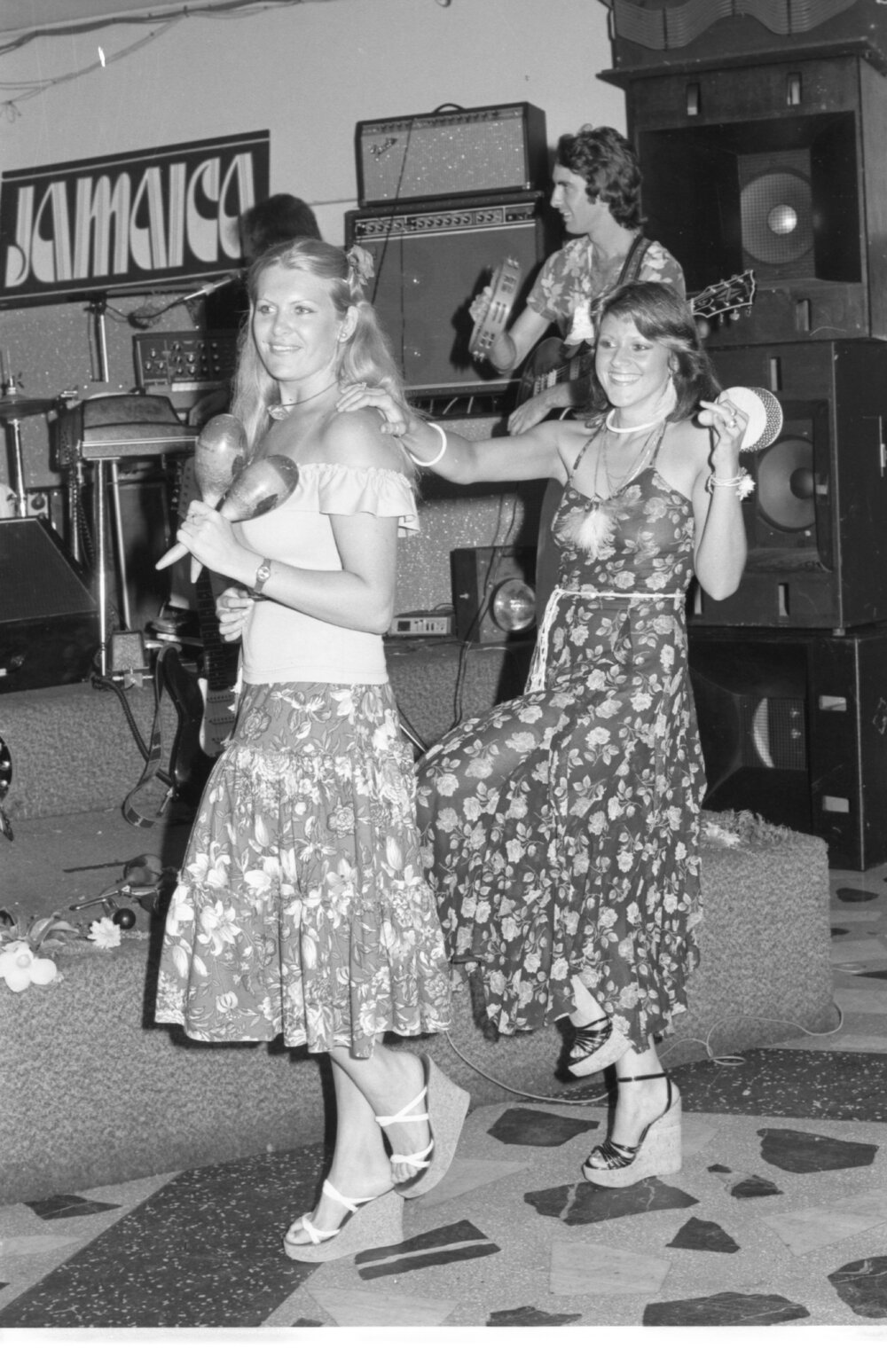 Unidentified percussionists playing the maracas, the tambourine, and the cabasa in a band, Ipswich, February 1978