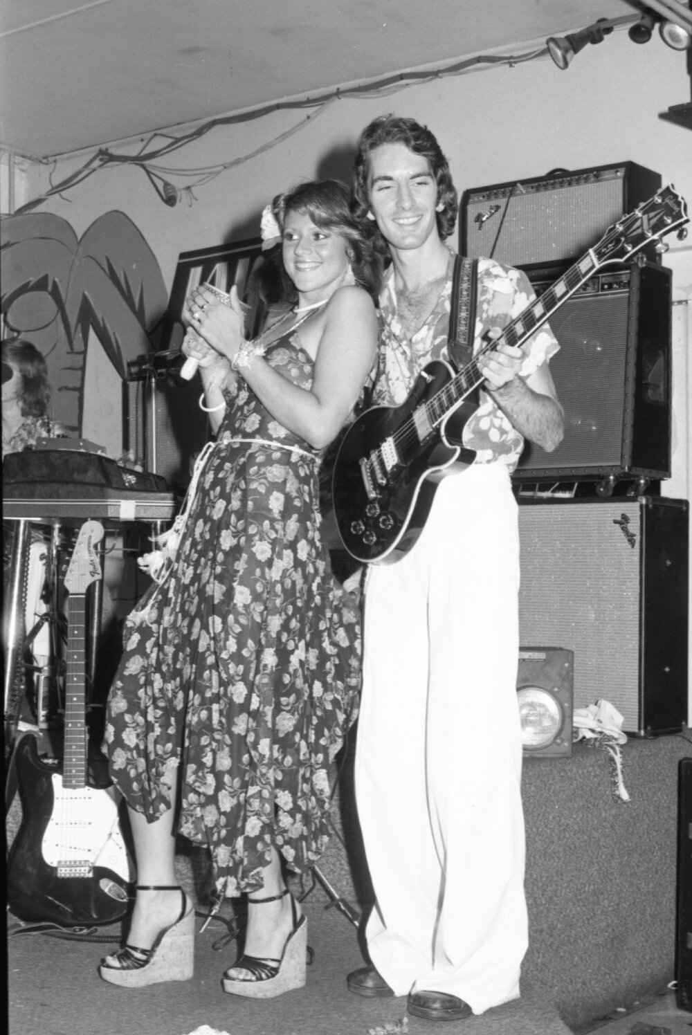 Unidentified musicians in a band playing guitar and cabasa, Ipswich, February 1978