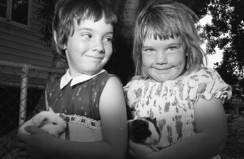 Girls with guinea pigs, Ipswich, November 1977