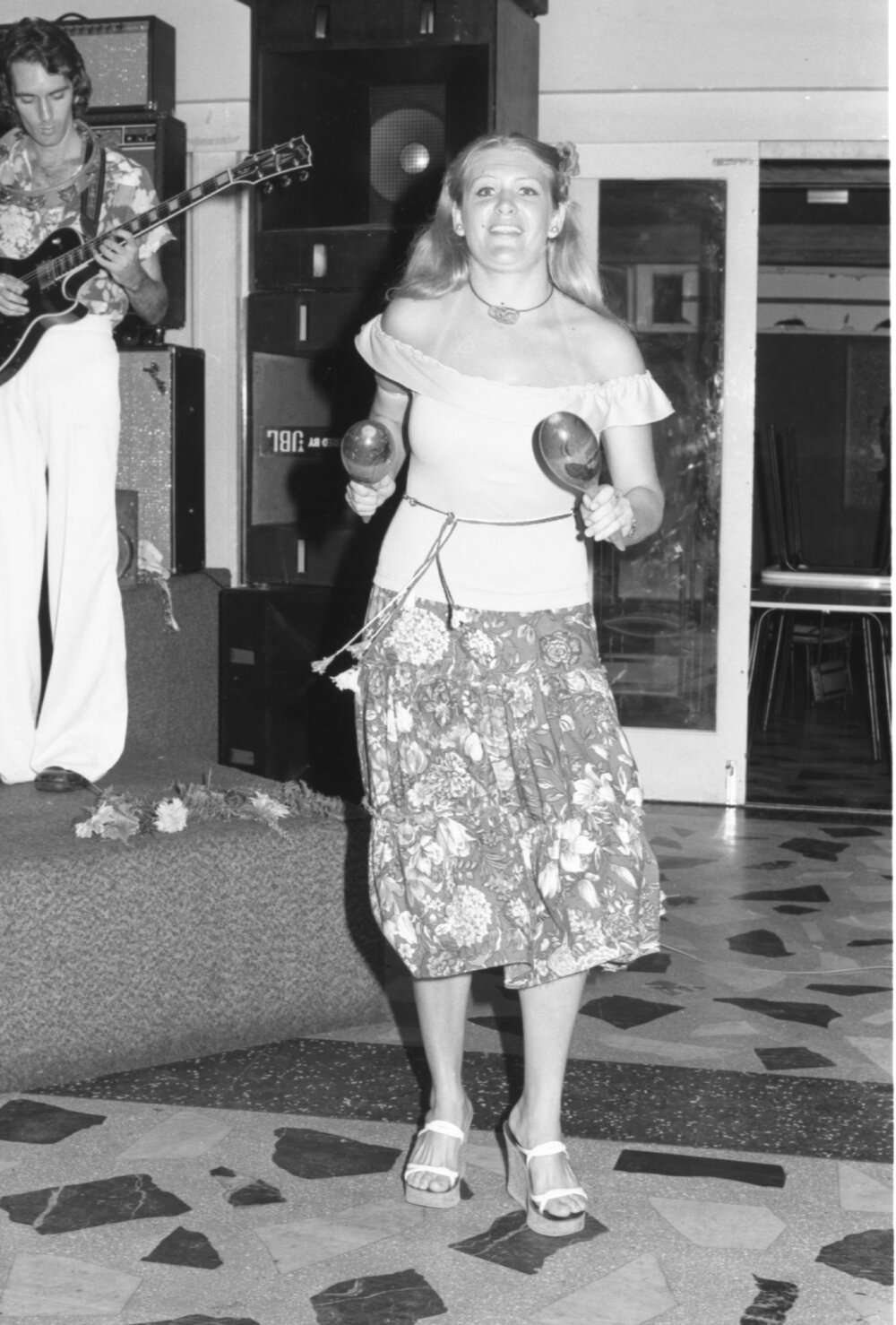 Unidentified percussionist with maracas and guitarist in a band, Ipswich, February 1978