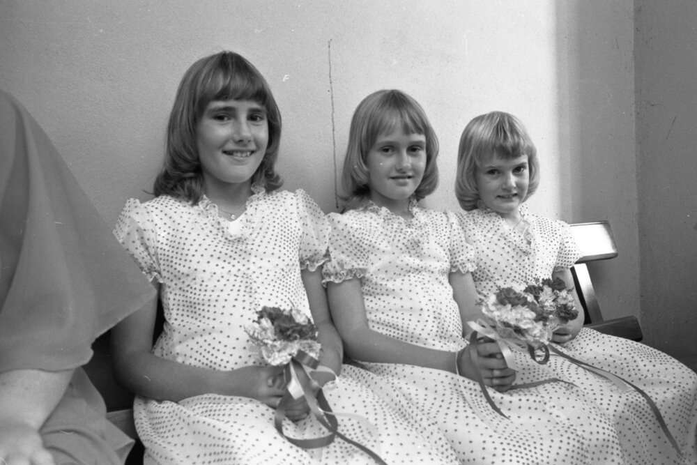 Unidentified flower girls in matching dresses, Ipswich, Queensland, February 1978