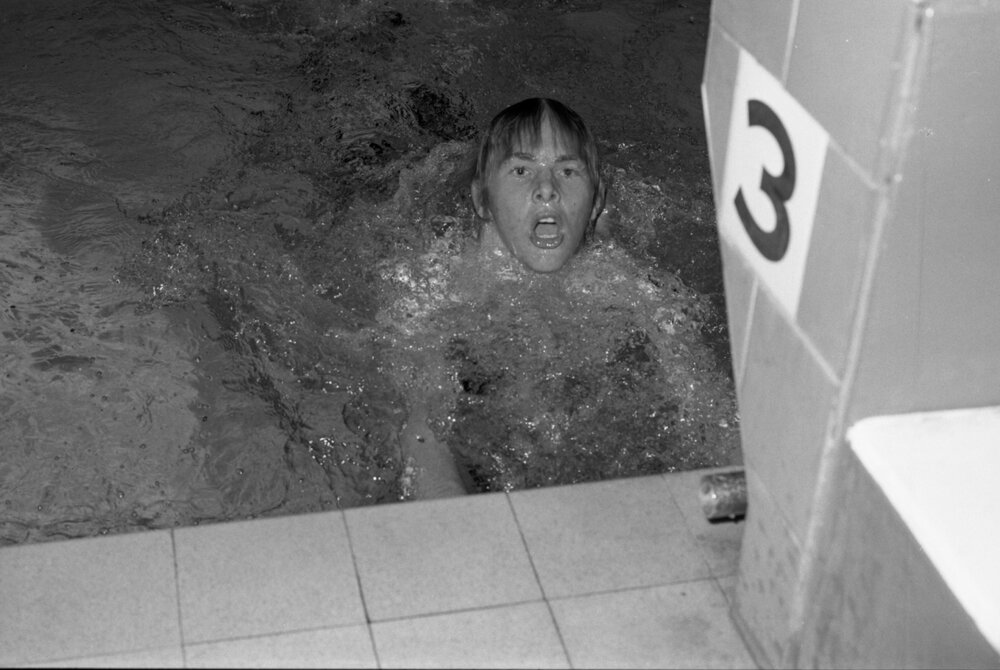 Young man swimming in a pool, Ipswich, February 1978