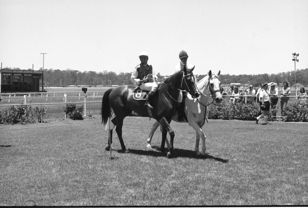 Two identified jockeys at Ipswich Turf Club, Ipswich, Queensland, February 1978 
