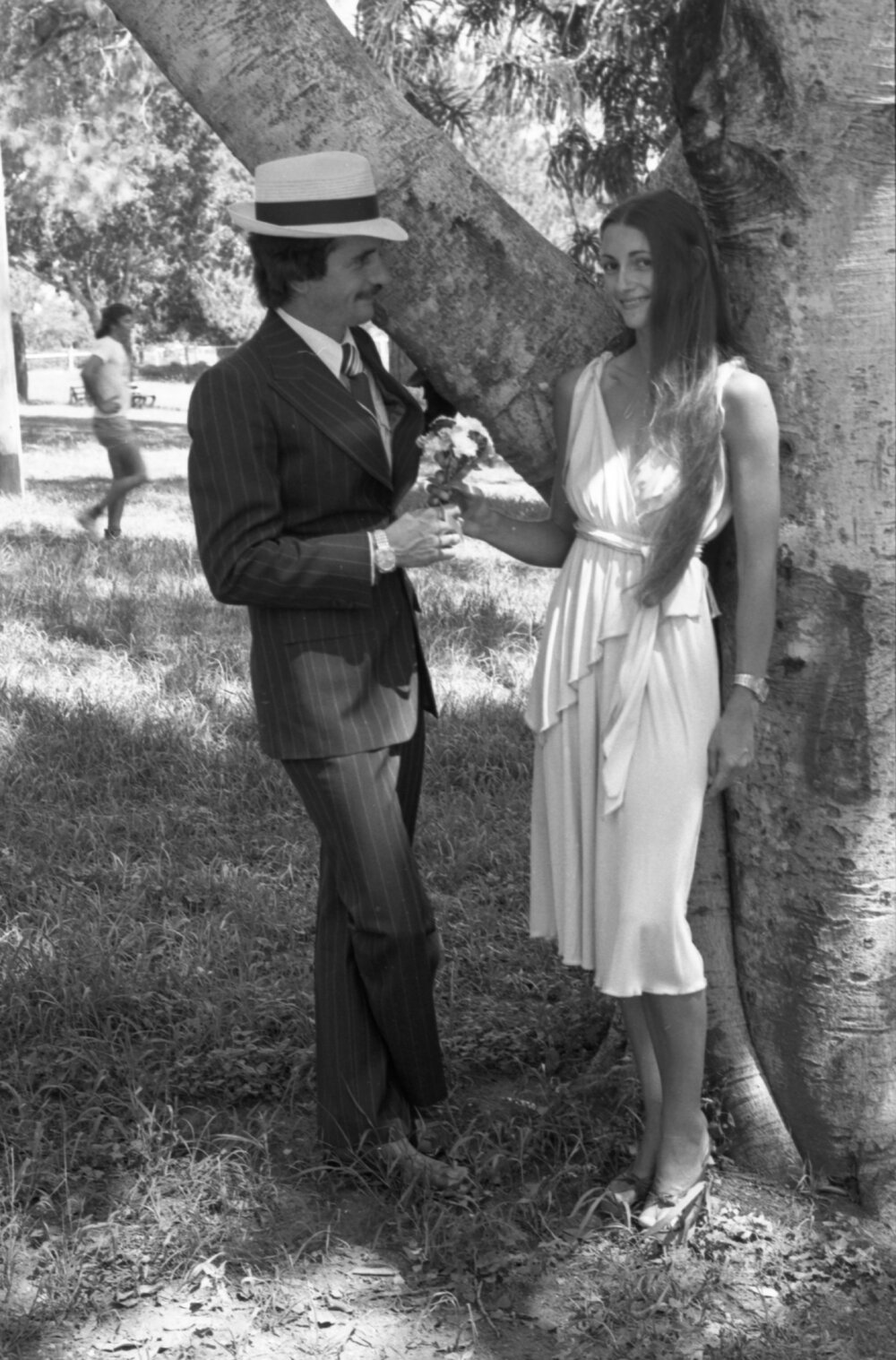 Unidentified man and woman posing for a Valentine's Day photo series in Queens Park, Ipswich, February 1978