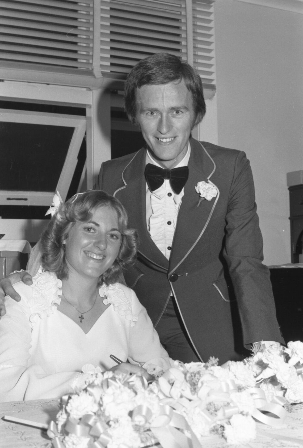 Newlywed couple with their marriage certificate, Ipswich, Queensland, February 1978