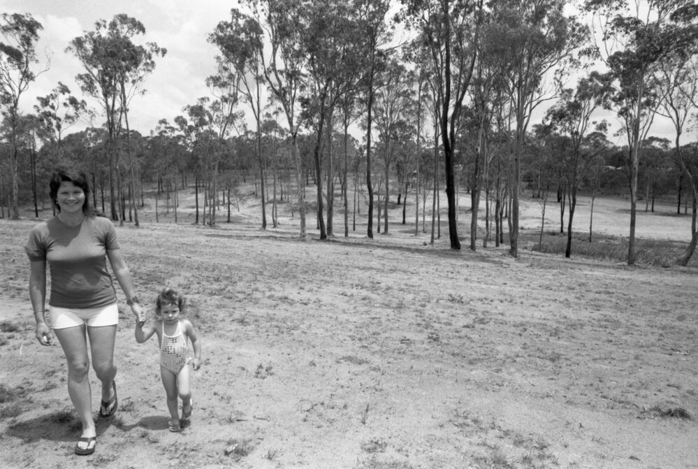 Thought to be mother and daughter at a new park, Ipswich, November 1977