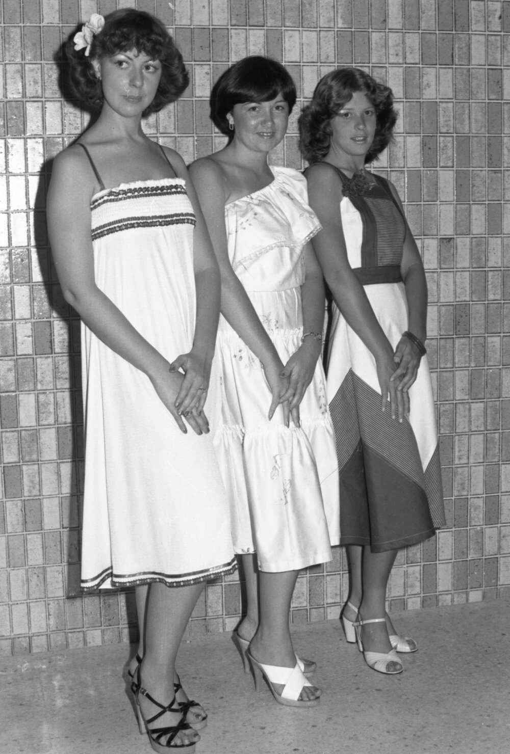 Models advertising dresses, Ipswich, November 1977