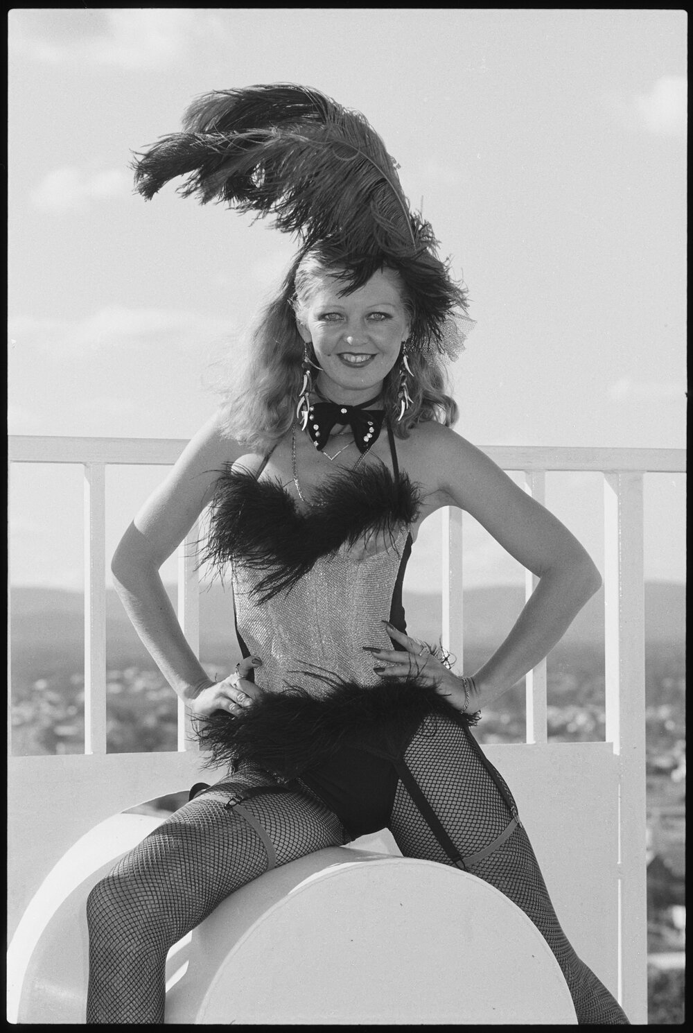 Unidentified Burlesque dancer standing on the Denmark Hill Water Tower, Ipswich, July 1985