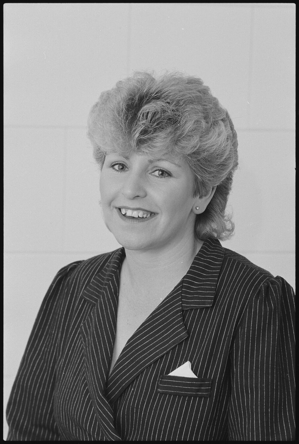 Unidentified woman in pinstripe blazer, Ipswich, July 1985