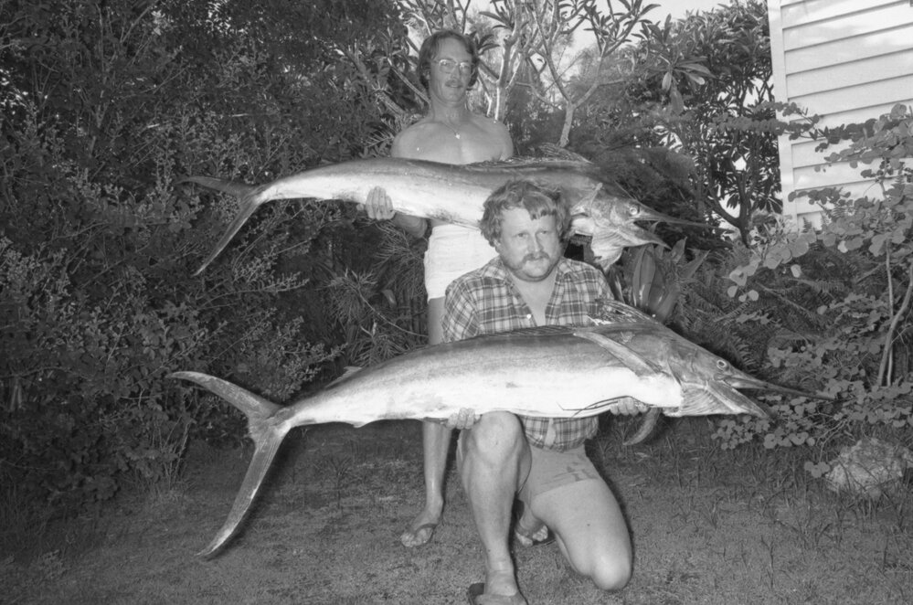 Fishermen holding roundscale spearfish, Ipswich, November 1977