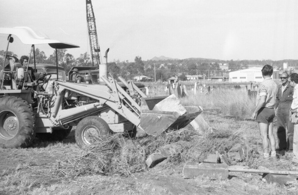 Relocation of grave markers by front end wheel loader during Ipswich General Cemetery 'Clean-Up' campaign, Ipswich, 18th June 1977