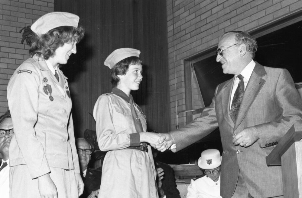 Mayor George Hastings making a presentation to two members of the Salvation Army, Ipswich, November 1977