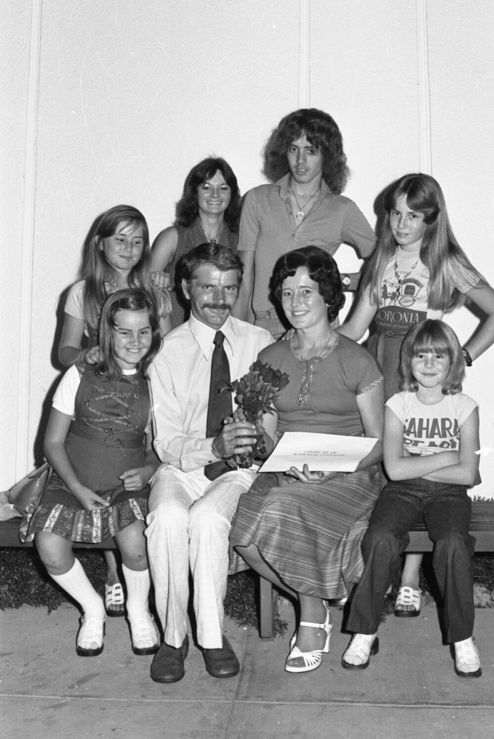 Family receiving their Australian citizenship, Ipswich, November 1977