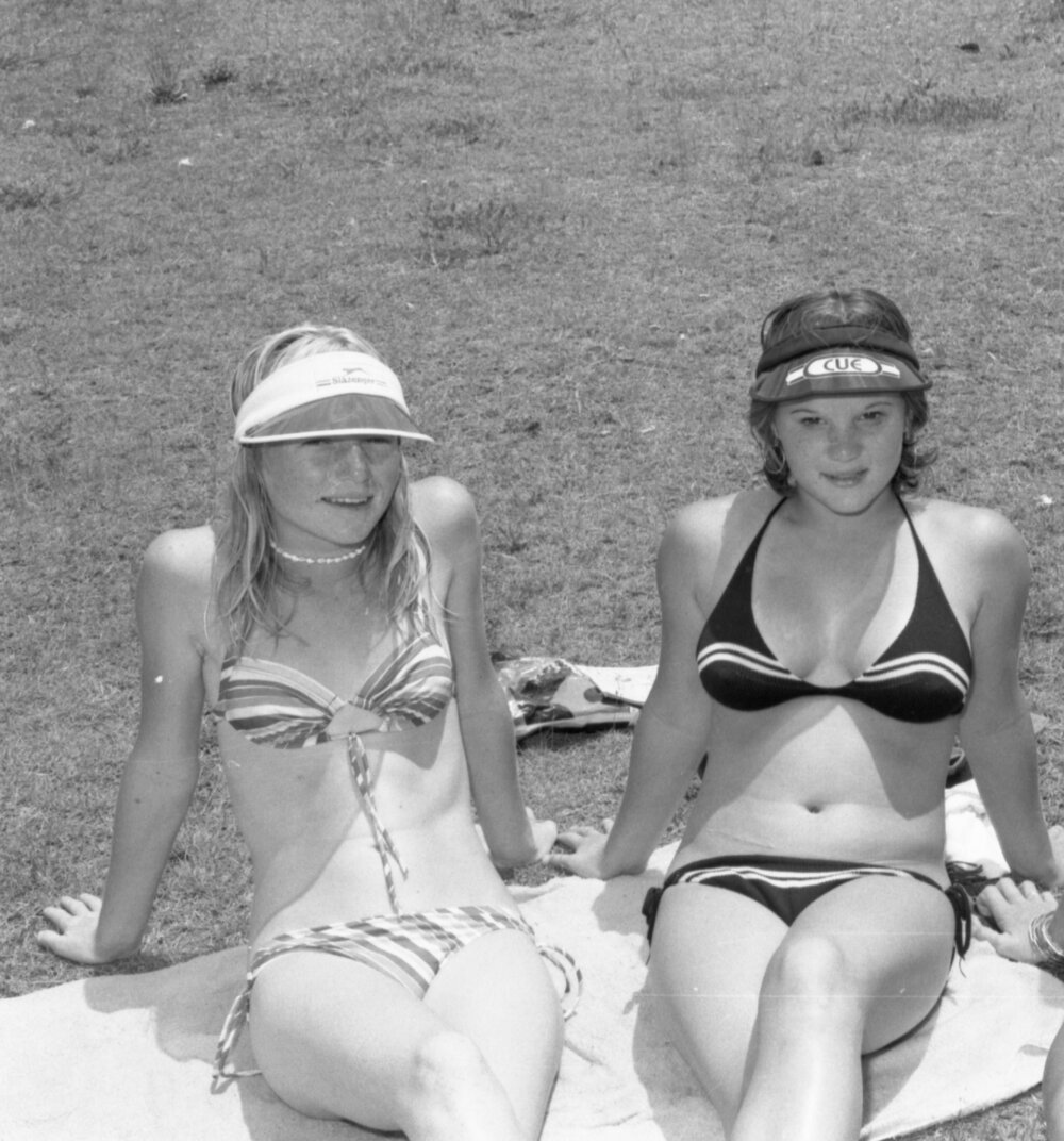 Girls sunbathing, Ipswich, November 1977