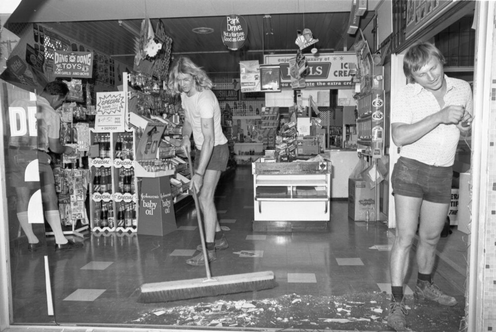 Store with a broken window, Ipswich, November 1977
