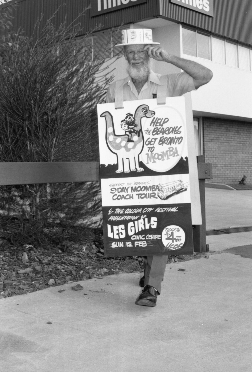 Unidentified fundraiser from Ipswich Beardies advertising the promotion for the parade float Bronto to travel to Moomba, outside the Queensland Times building, Brisbane Street, West Ipswich, Ipswich, February 1978