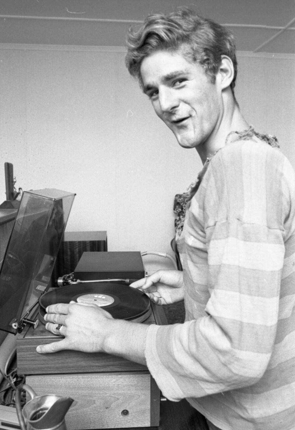 Unidentified man playing vinyl records, Ipswich, Queensland, February 1978