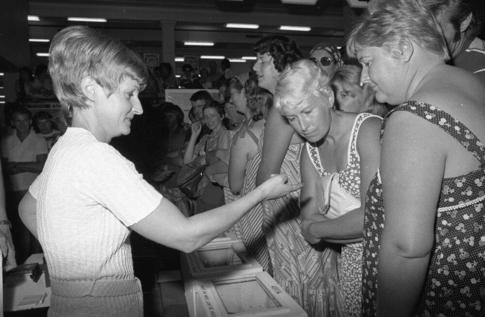 Unidentified member of the audience shows crowd snake bite at Ram Chandra's Snake Demonstration in Reid's, Ipswich, February 1078