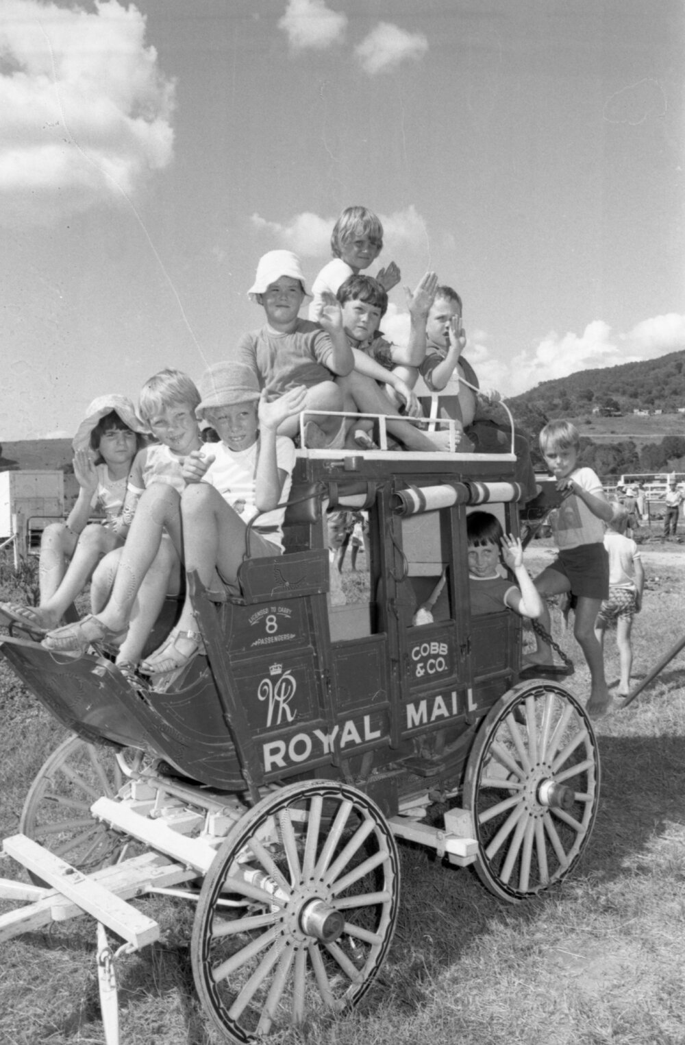 Children playing in a miniature replica of a Royal Mail Coach at an unidentified horse event, Ipswich, February 1978