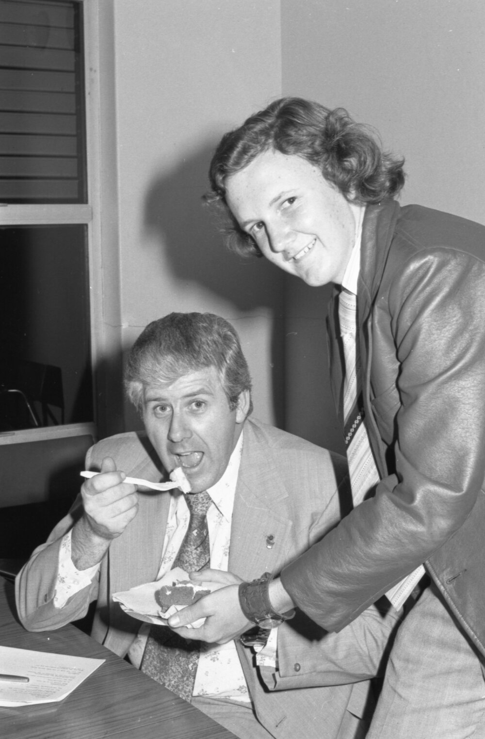 Unidentified man eating a cake, Ipswich, 7th October 1977