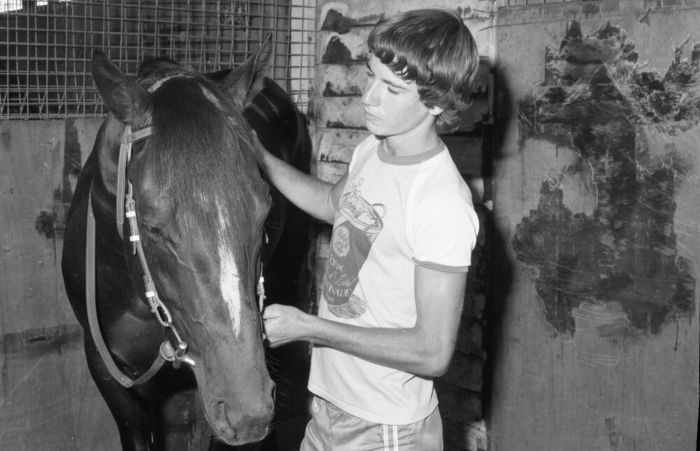 Young man with horse at Claremont Open Day, Ipswich, March 1981