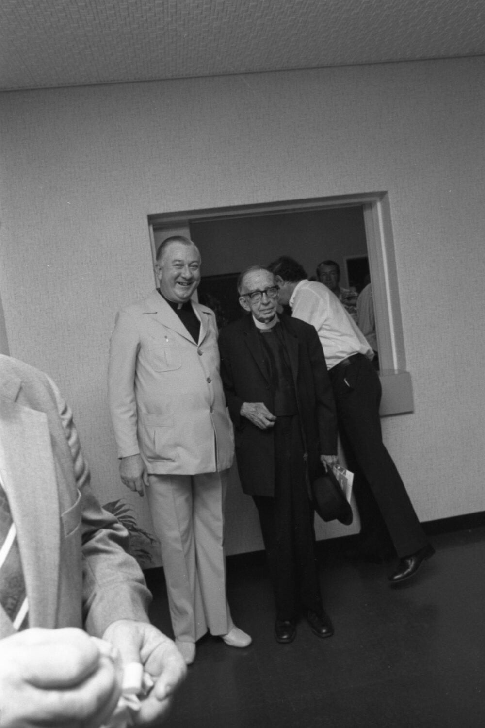 Rev. Dr. O. K. Oxenham and unidentified priest attending the reopening of St Mary's Hall after refurbishment, Woodend, Ipswich, Queensland, February 1978