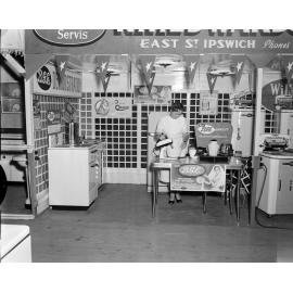 Staff demonstrating a BGE mixmaster at the R.T. Edwards & Sons electrical appliance display stand at the Ipswich Show, Ipswich, 1957