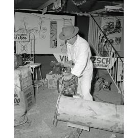 Vic Loetzsch Cycles, Motorcycles & Chainsaws display at the Ipswich Show, Ipswich, 1958