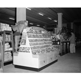 Staff at Cribb and Foote Hardware, Andersons seed packet display, Bell Street, Ipswich, 1958